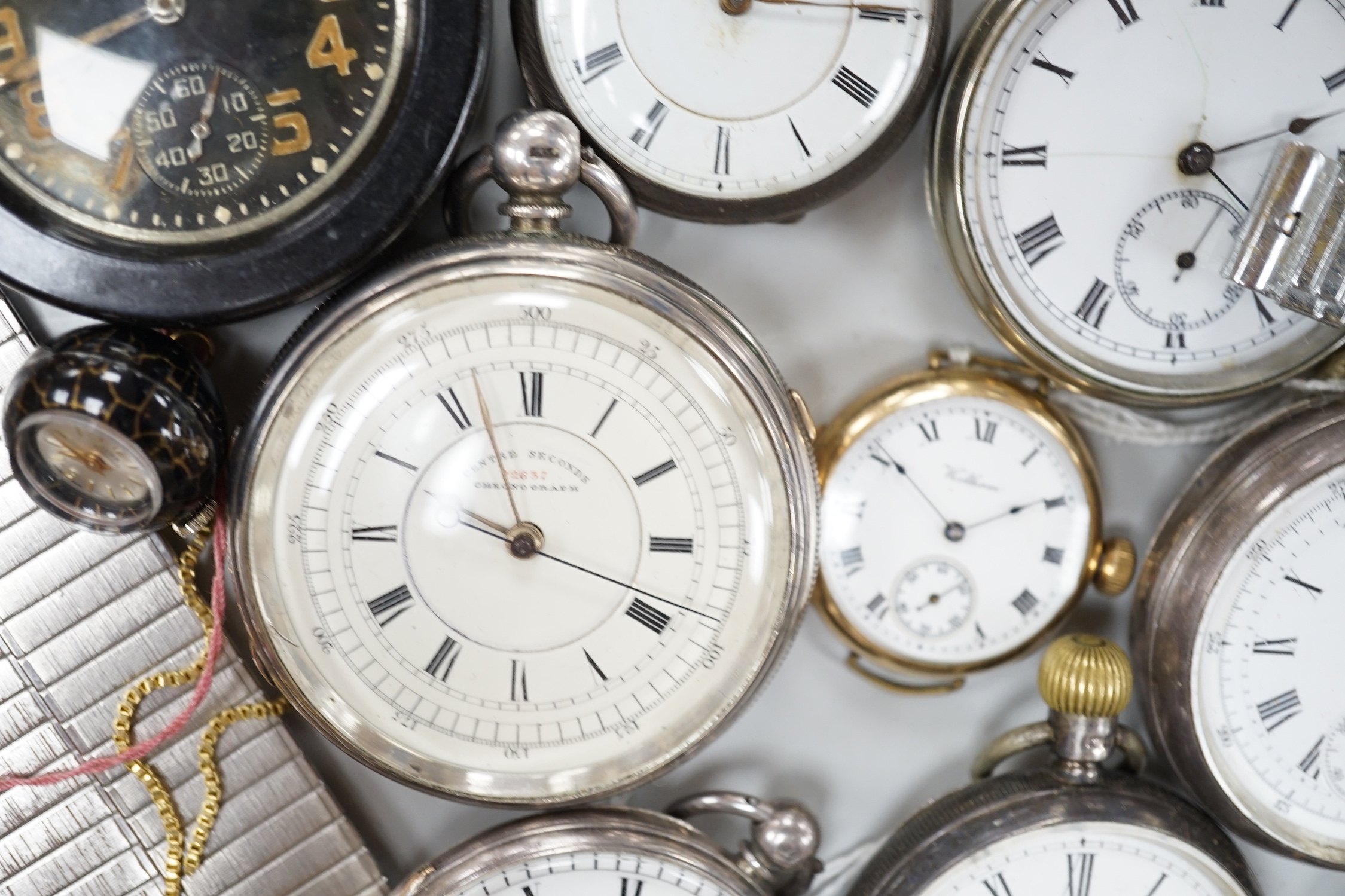 Twenty one assorted silver or base metal pocket watches including Waltham and Child of Birmingham, three wrist watches and a silver vesta case.